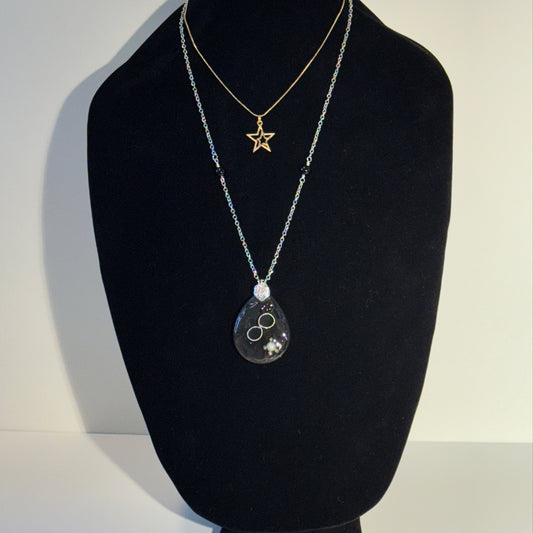 "Mixed metals, timeless meaning."