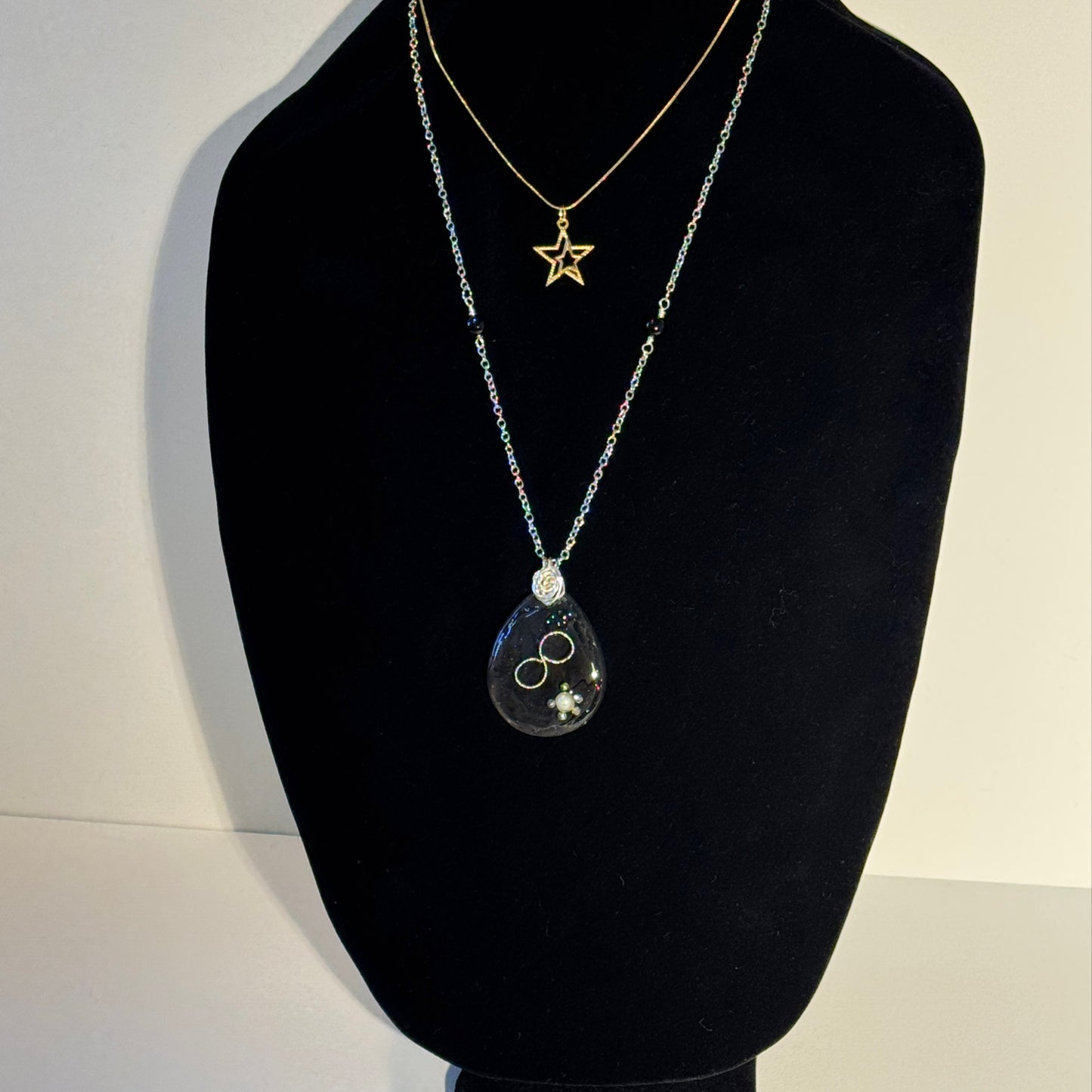 "Mixed metals, timeless meaning."