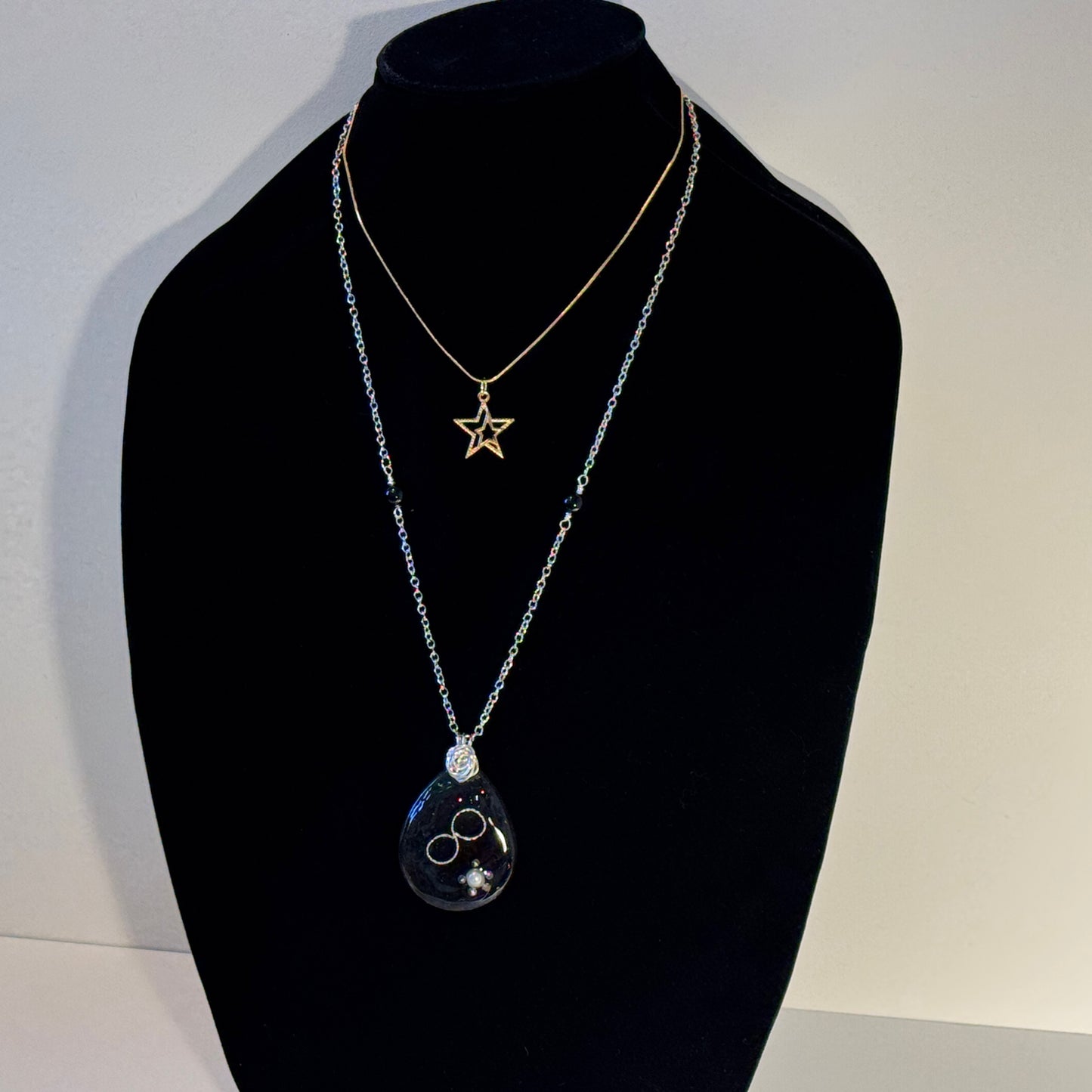 "Mixed metals, timeless meaning."