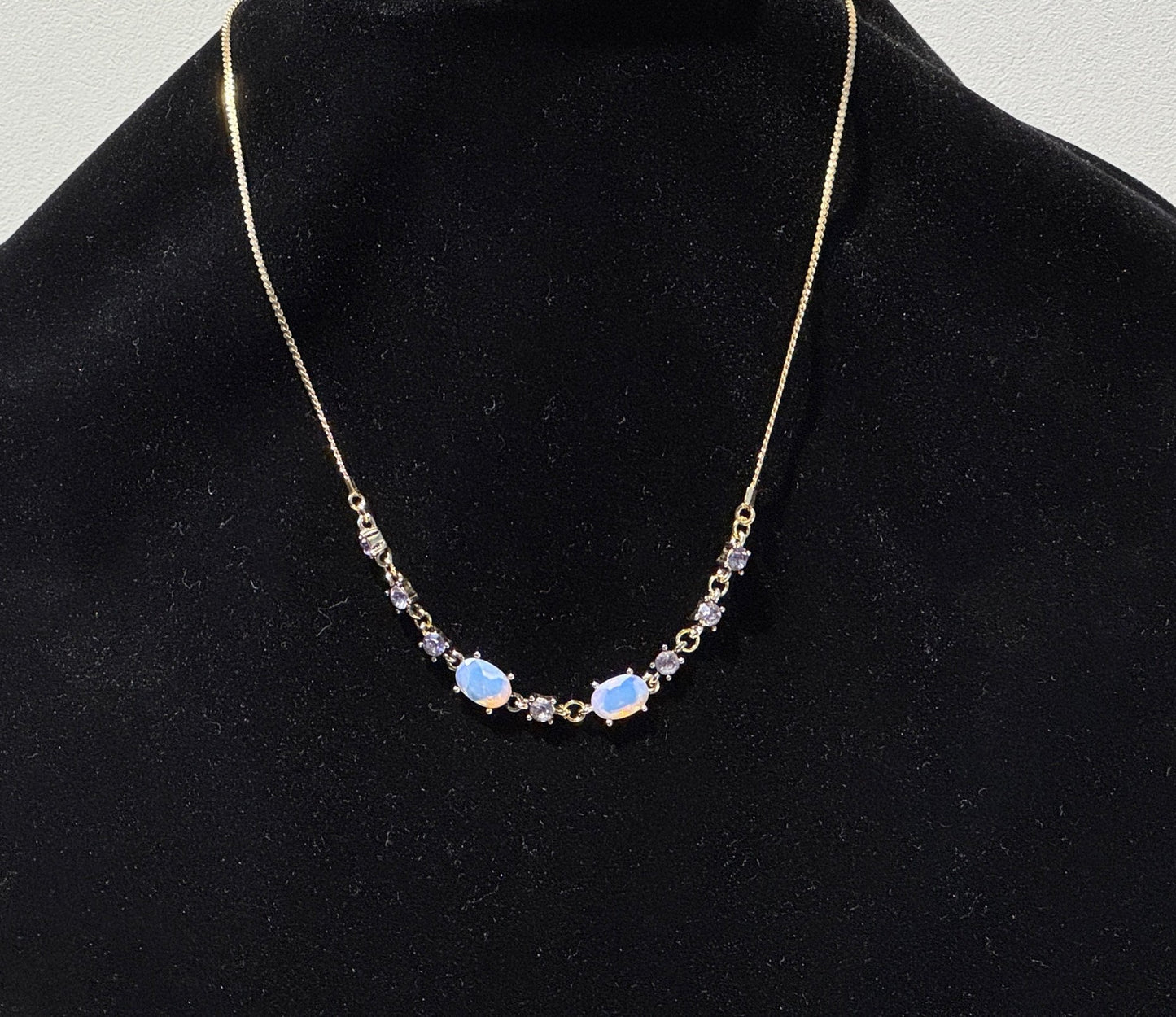 "Delicate sparkle, timeless glow." - Necklace with opals and crystals