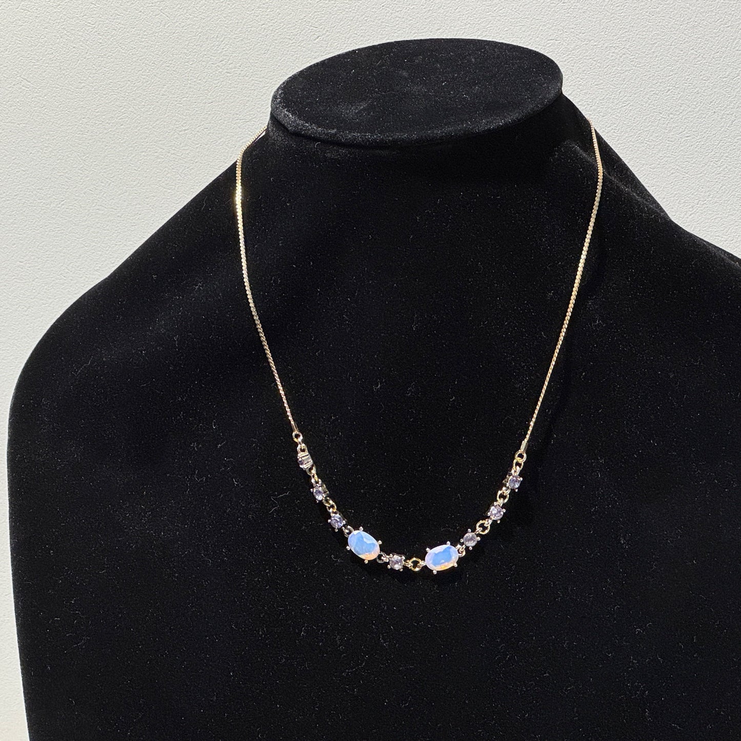 "Delicate sparkle, timeless glow." - Necklace with opals and crystals