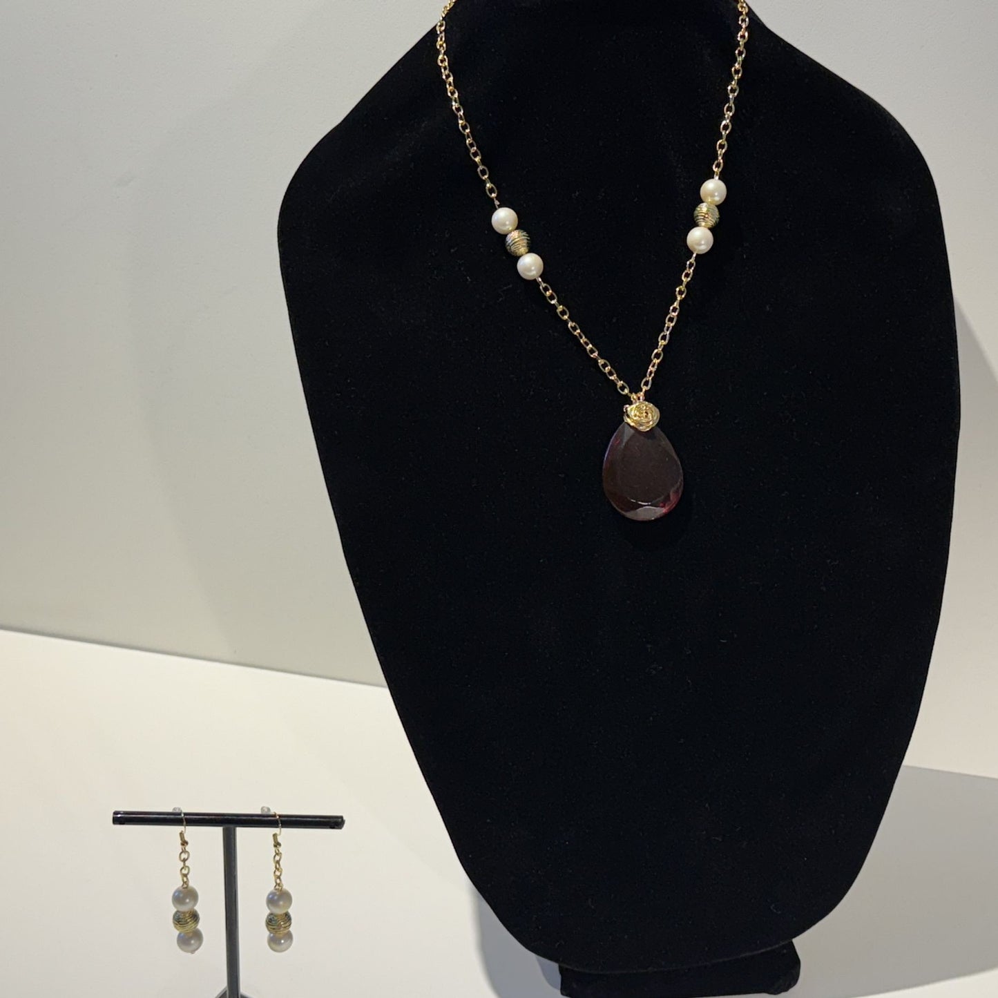 "Crafted to captivate." - Necklace and earring set