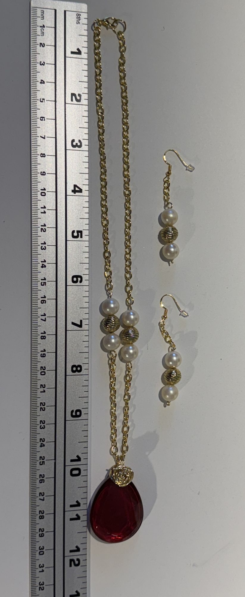 "Crafted to captivate." - Necklace and earring set