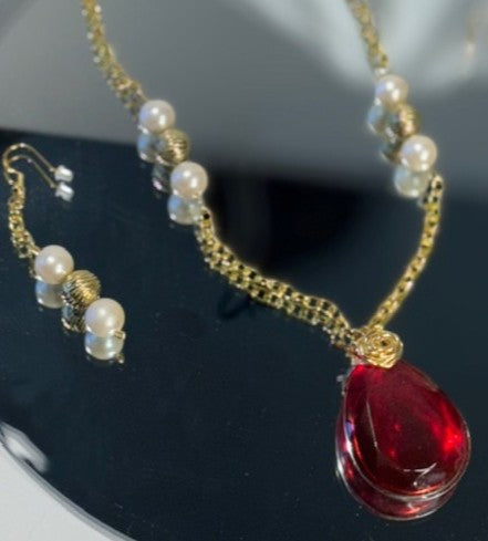"Crafted to captivate." - Necklace and earring set