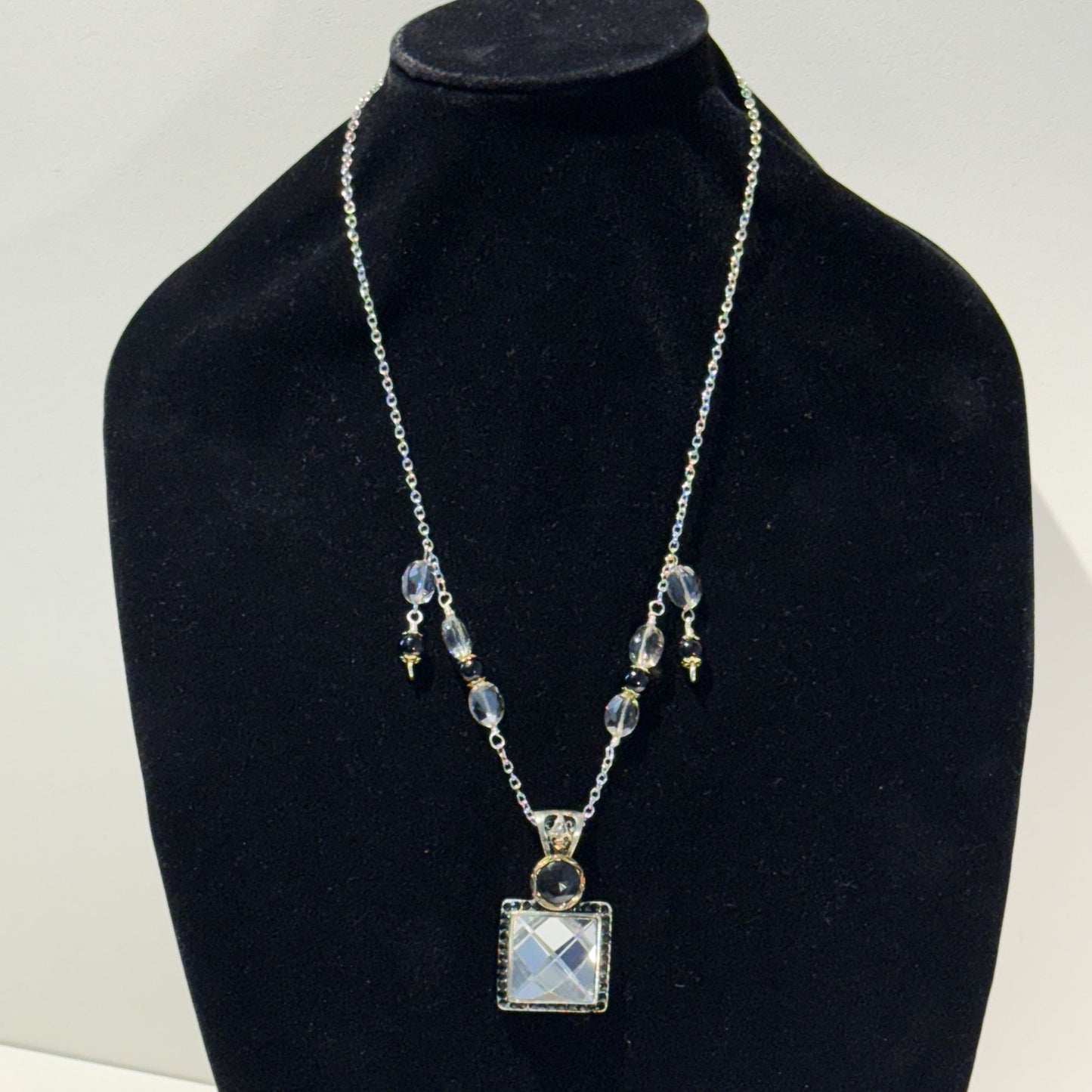 “Old-world charm, newly defined.” - Long mixed metals necklace