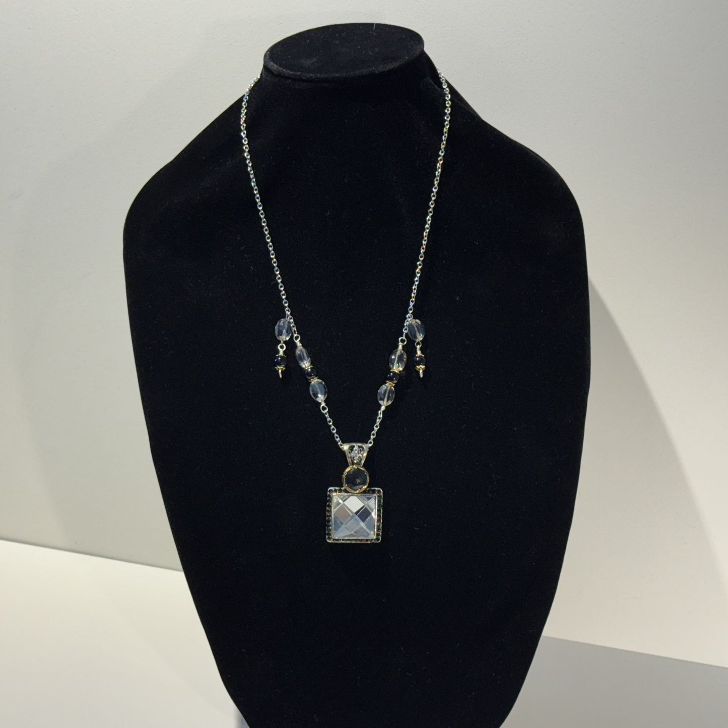 “Old-world charm, newly defined.” - Long mixed metals necklace