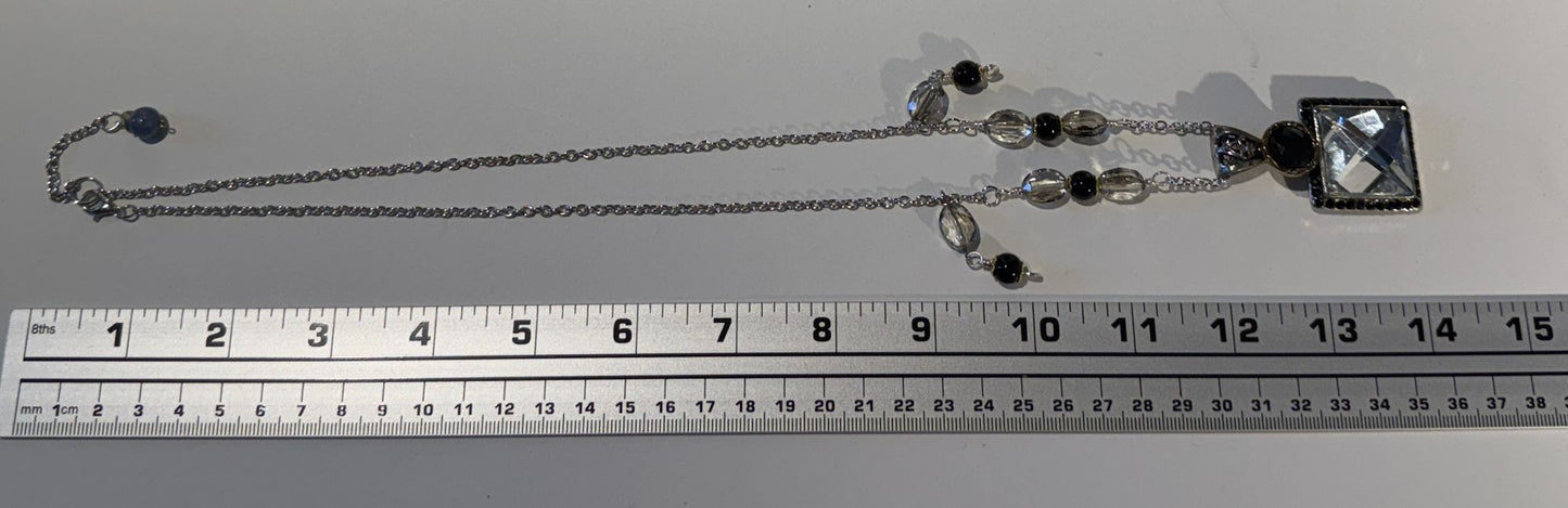 “Old-world charm, newly defined.” - Long mixed metals necklace