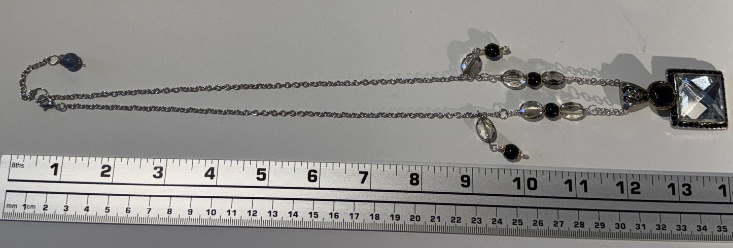 “Old-world charm, newly defined.” - Long mixed metals necklace