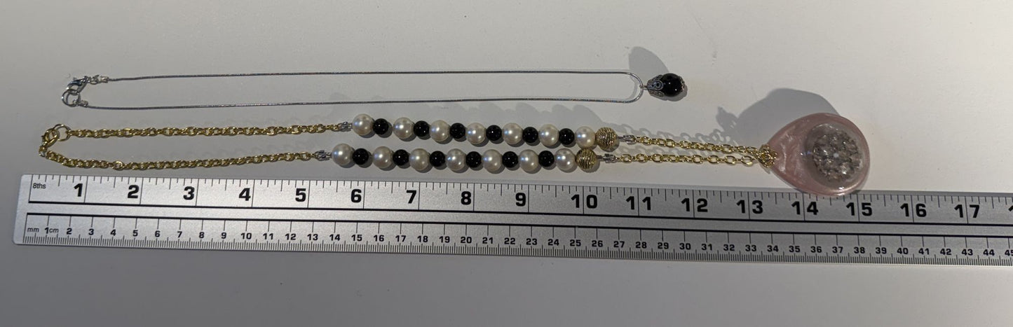 "Romance reimagined in every detail.”- Mixed metals necklace set