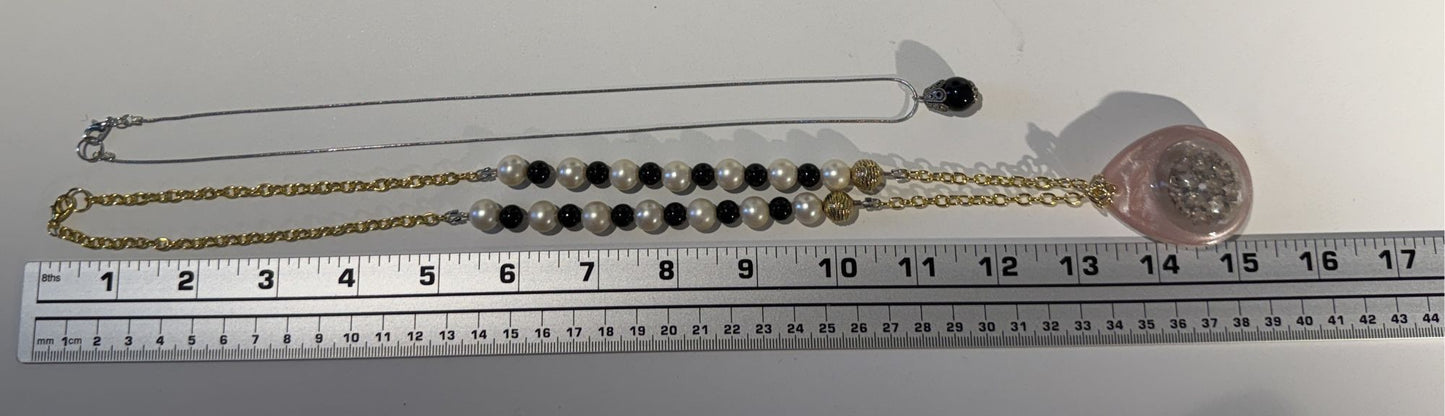 "Romance reimagined in every detail.”- Mixed metals necklace set