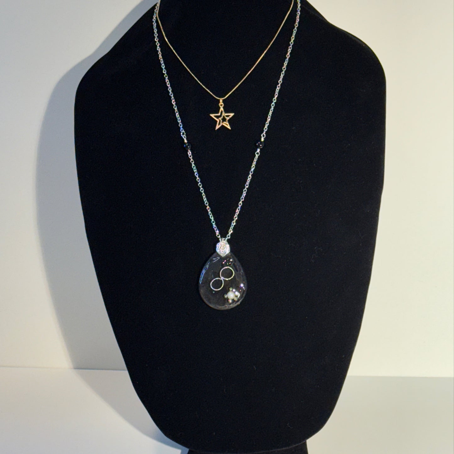 "Mixed metals, timeless meaning."