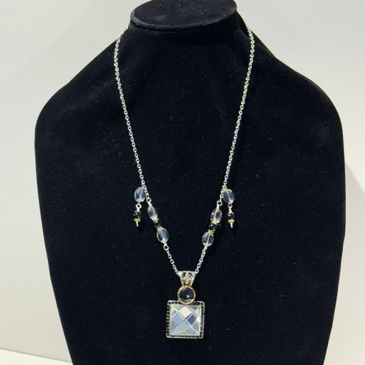 “Old-world charm, newly defined.” - Long mixed metals necklace
